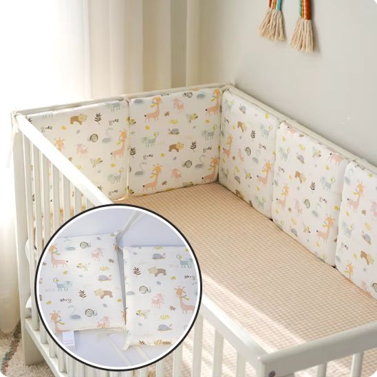 Tour de lit bébé attache gros plan